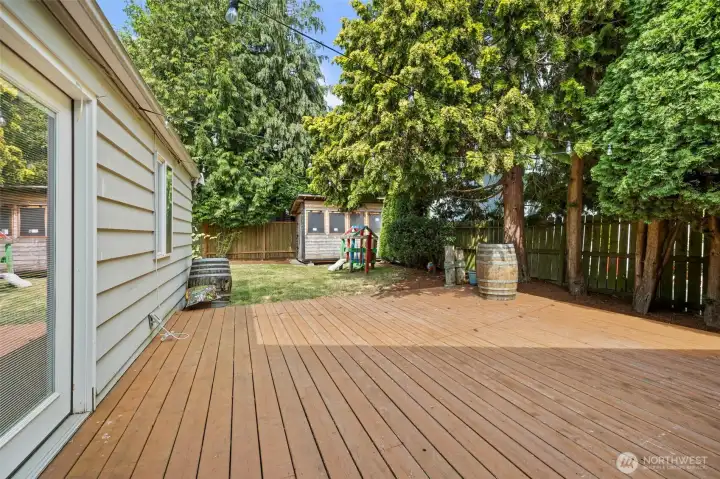 French doors off the family room open to large deck French doors off the family room open to large deck