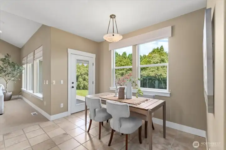 Breakfast nook with Glass door to the back patio Breakfast nook with Glass door to the back patio
