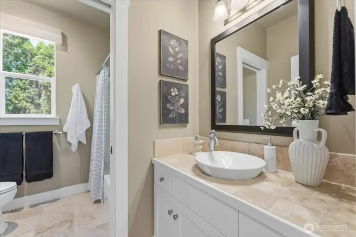 full guest bathroom with tub/ shower combo full guest bathroom with tub/ shower combo