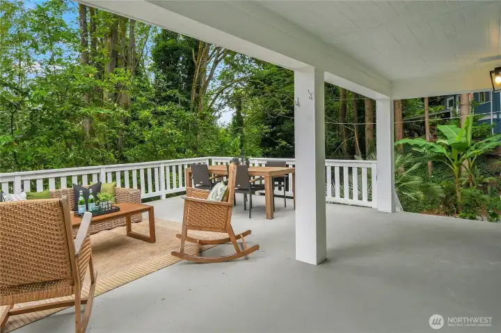 Expansive entertainment-sized deck overlooking the peaceful wooded setting, ideal for outdoor dining, relaxing, and summer BBQs. Expansive entertainment-sized deck overlooking the peaceful wooded setting, ideal for outdoor dining, relaxing, and summer BBQs.