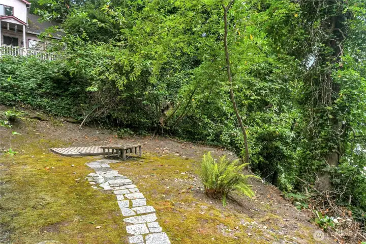 Enjoy evenings gathered around the backyard firepit in your own private urban oasis surrounded by mature trees. Enjoy evenings gathered around the backyard firepit in your own private urban oasis surrounded by mature trees.
