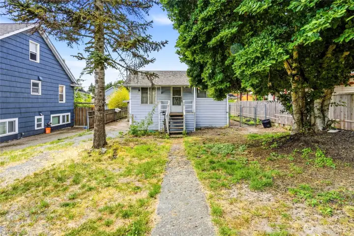 INVESTOR/BUILDERS ALERT! Bring your vision & tool belt to unlock endless potential in this diamond in the rough jewel in the heart of Beacon Hill. VALUE IN THE LAND! Prime spacious flat lot zoned NR3 offers incredible build opportunity to restore home and/or build additional dwelling units for optimal use.
