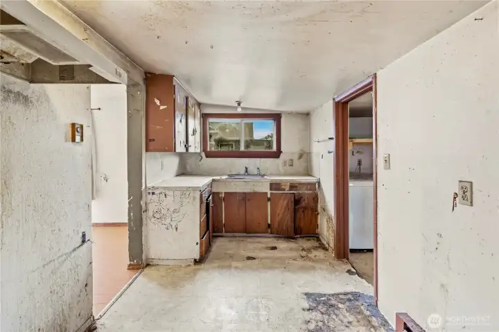 Past the living room is the kitchen.