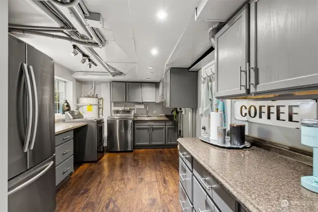 Here, the lower level kitchen / laundry room combo