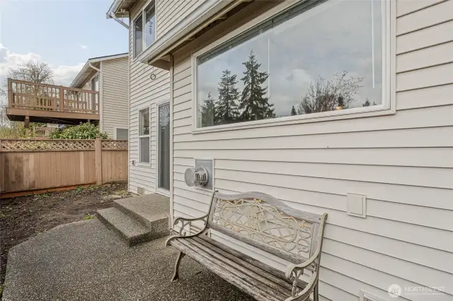 Fully fenced back yard and patio.