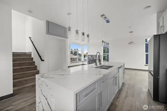 This kitchen showcases the lay out and high finishes you can expect in the newly constructed home at 8608 42nd Ave S, Seattle, WA 98118, built by the same builder."