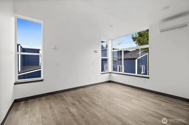This Primary room showcases the layout and high finishes you can expect in the newly constructed home at 8608 42nd Ave S, Seattle, WA 98118, built by the same builder.