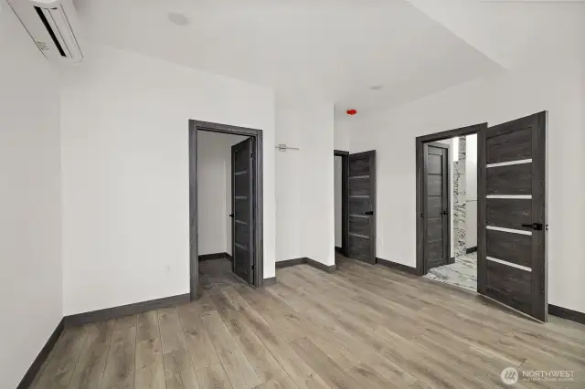This bedroom showcases the layout and high finishes you can expect in the newly constructed home at 8608 42nd Ave S, Seattle, WA 98118, built by the same builder.
