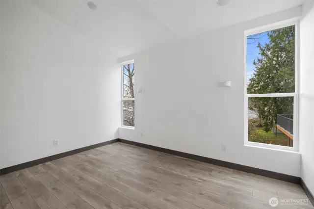 This bedroom showcases the layout and high finishes you can expect in the newly constructed home at 8608 42nd Ave S, Seattle, WA 98118, built by the same builder.