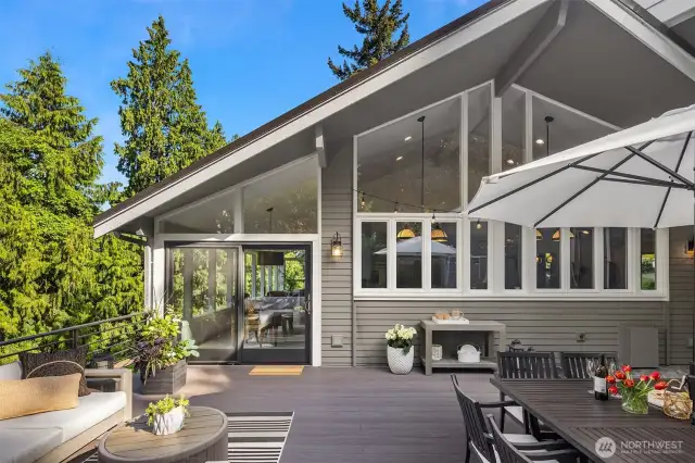 Step out onto the expansive wraparound deck—perfect for alfresco dining and gatherings with friends and family.
