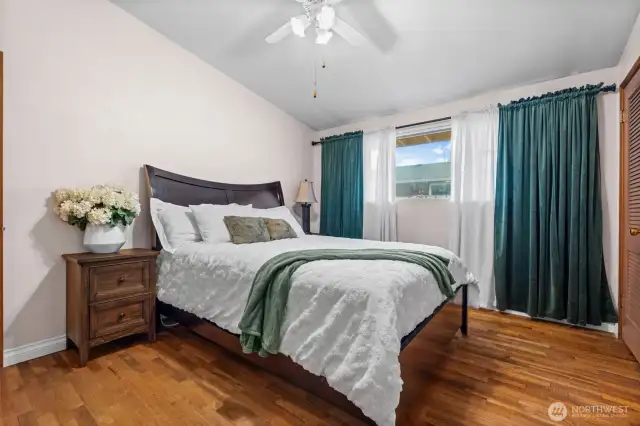 The high ceilings and natural hardwoods continue into the bedrooms, giving them a nice open feel.