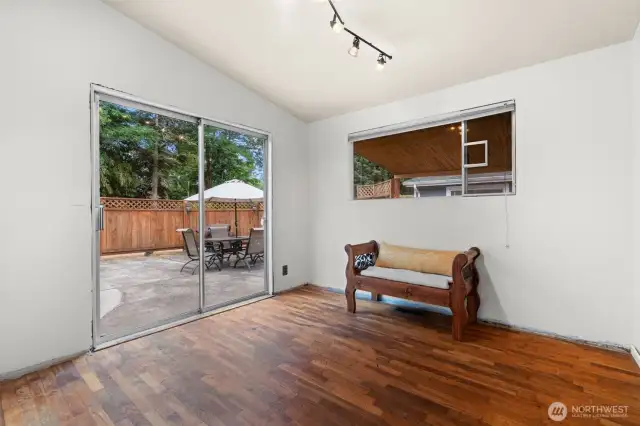 Bedroom #2 has its own private access to the back patio. Baseboard trim was removed for carpet removal and painting, it has since been re installed.