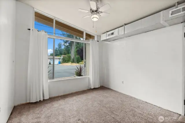 Access to the utility closet from this room. Tankless Instant Hot water heater!