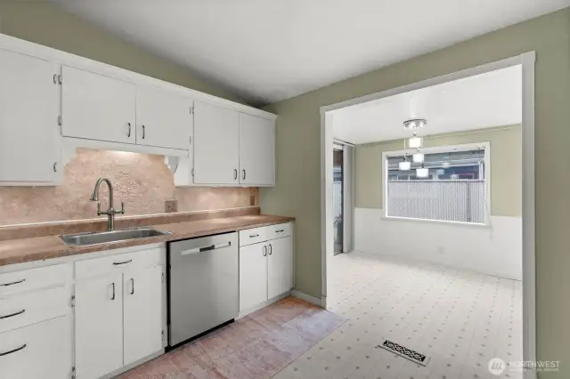 The kitchen is a combination of modern appliances and unique home town charm.