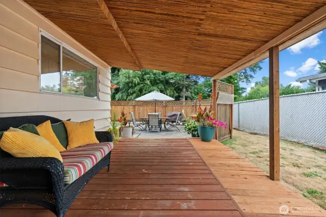 Enjoy morning coffee on the covered back porch during any weather.