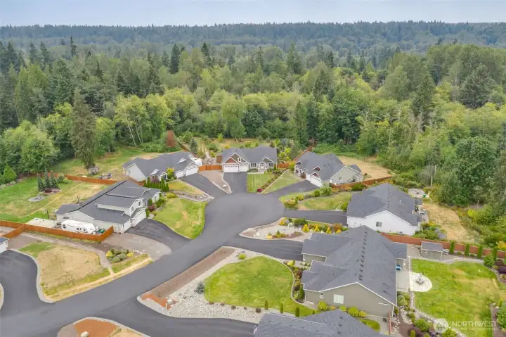 Set on a private, park-like acre, this beautiful custom rambler is surrounded by mature trees and protected greenbelt. Located in peaceful cul-de-sac, this home embodies luxury, privacy and Northwest charm.