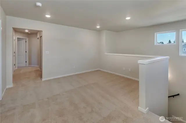 Photos are taken of a Shelby plan previously built in the community.
