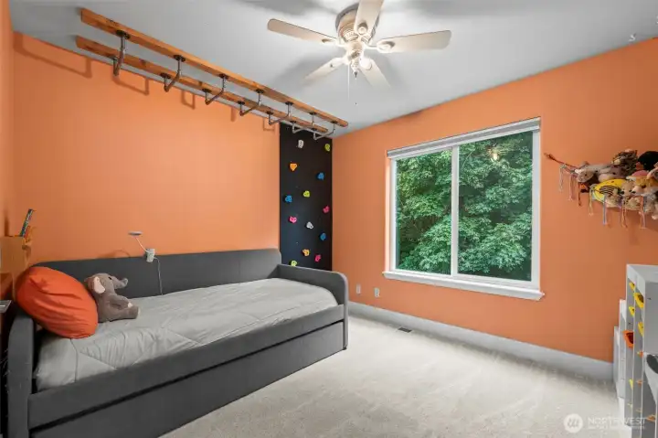 This fun secondary bedroom is ready for the spirited adventurer.