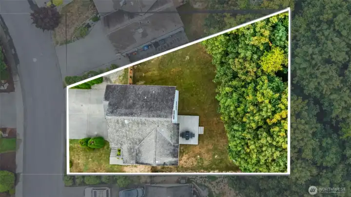 Property line goes beyond the fenceline into the greenbelt.