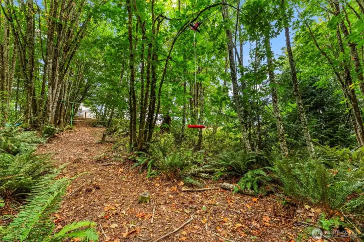 Greenbelt setting provides privacy and connection to nature.