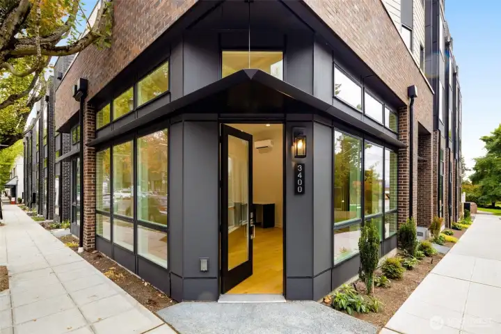 Situated on the corner of East Spring St & 34th Ave, this commercial ready home offers prime storefront opportunities