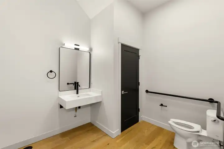 Professional looking ground level bath, currently being remodeled to include a full tub