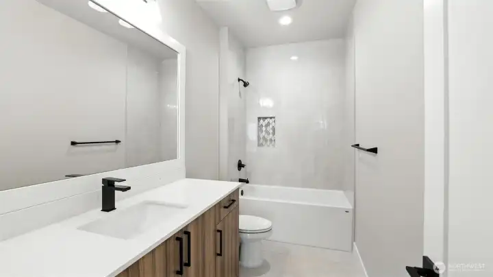 Guest Full Bath on the Upper Level.