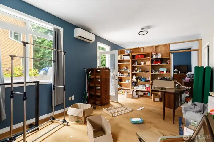 Primary Bedroom with a temporary sleeping area walled off.