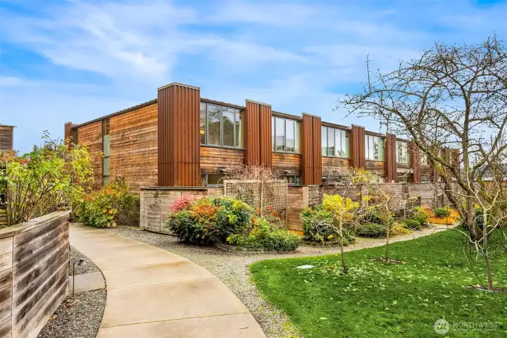 This photo shows the back of the deck, which can be accessed from a set of stairs to a path