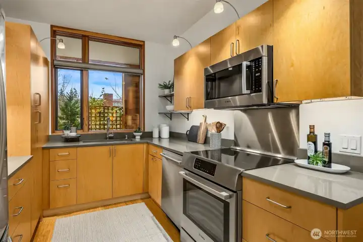 The induction cooktop on the range is one of the many green features of the home