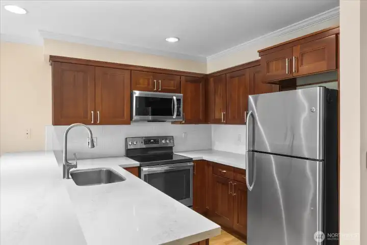 Newer cherry wood cabinets