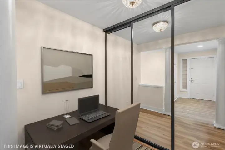 Office area with extra large closet with built-ins