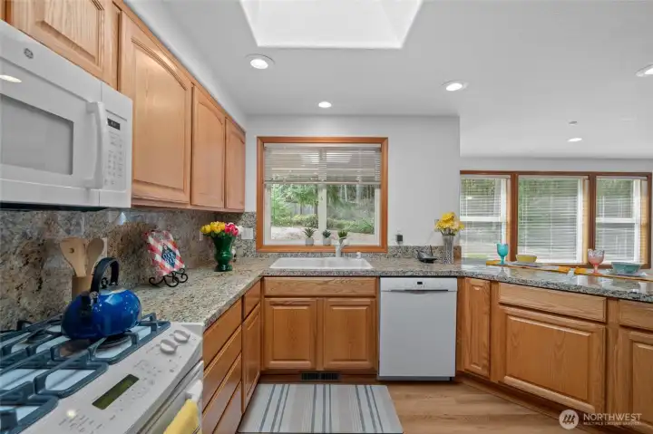 The kitchen window over the sink is wonderful, plus it is covered by the patio cover to extend the days.