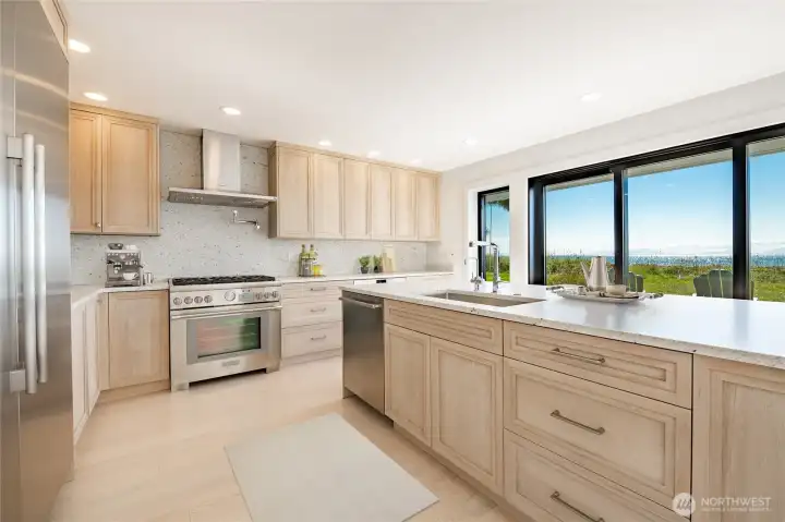 Solid oak cabinetry and upper end appliances including Thermador and Wolf