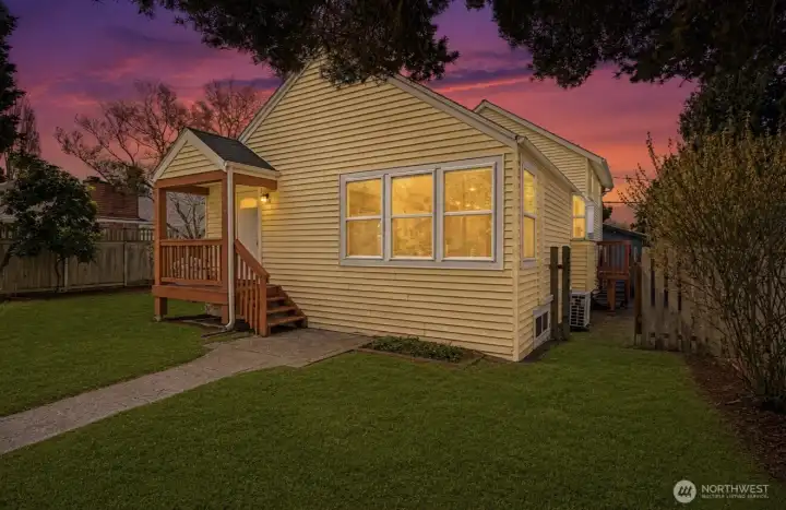 Inviting front porch, enjoy meals on the deck off the dining room, or relax on the private primary suite deck
