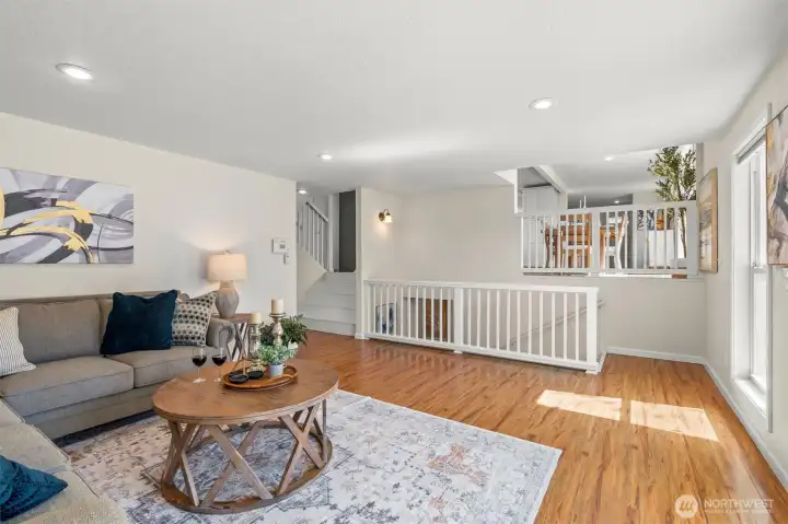 Back down on the main level, take a short staircase down and find the family room