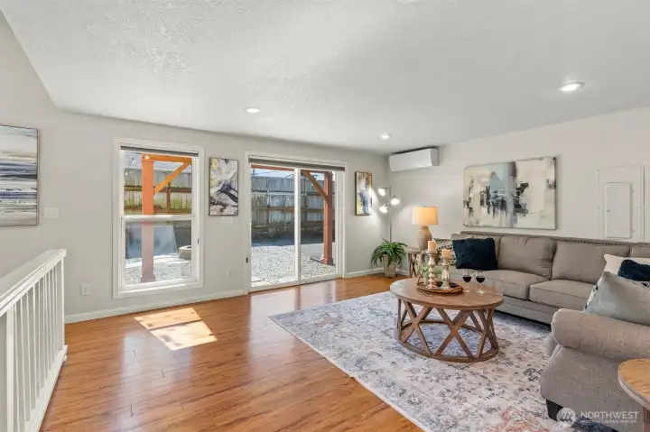 Slider leads out to the backyard and firepit area