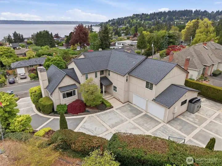 Welcome to 18124 Riviera Place. This handsome property is sited above the street with western views to Puget Sound.