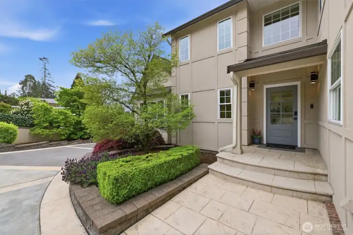 The private entry is set away from the street and offers a welcoming feel.