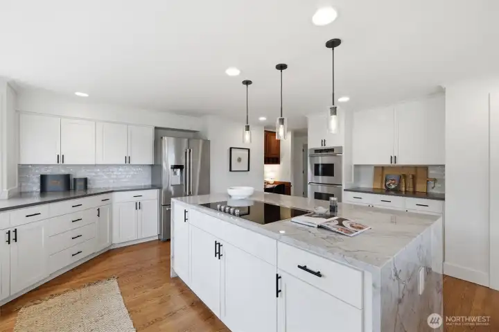 A view towards the work station and appliances. The huge walk-in pantry is on the right but not viewable in the photo.