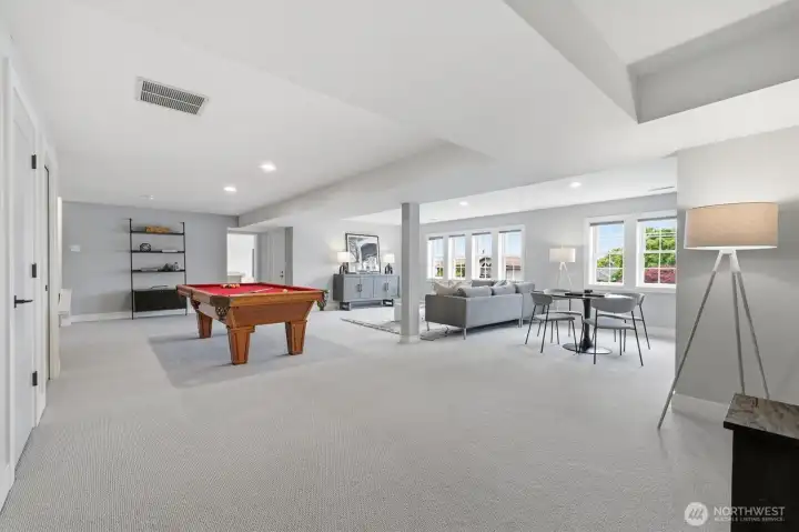 The lower level basement is ginormous and ready for all your recreation needs.