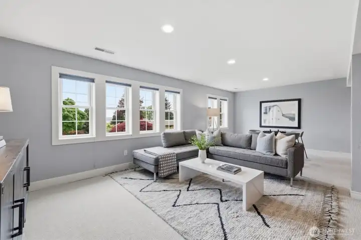 The lower level has been used as additional media room, game room, office and guest space.