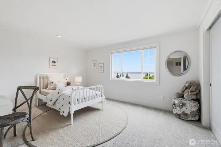 One of the 4 upper level bedrooms. This room offers western exposure.
