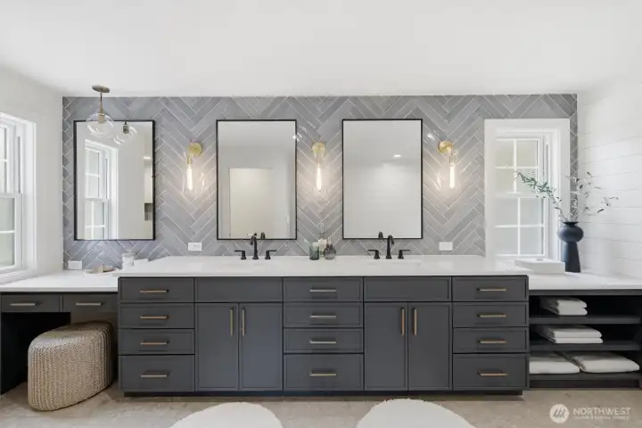 The bathroom has also been remodeled during their ownership with every surface touched. The vanity is a beautiful addition with dual sinks.