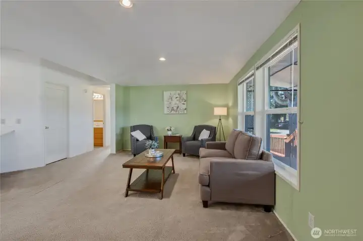 Family room/great room adjacent to kitchen right of entry