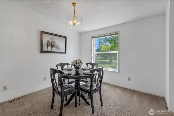 Dining off of kitchen and living room