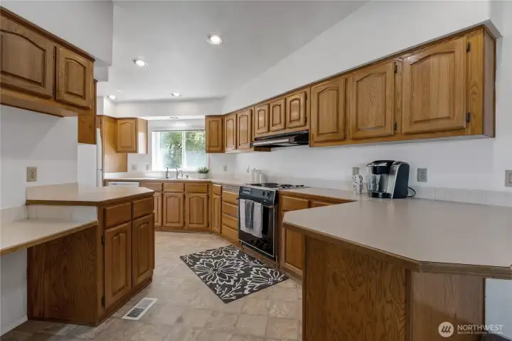 double entry kitchen with eating space