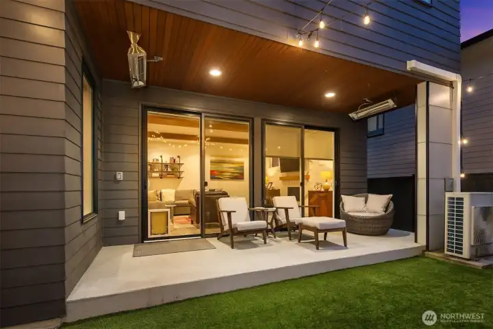 Evening lighting design carries through to the side terrace