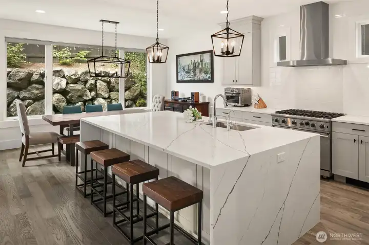Kitchen island and stone backsplash, built for entertaining