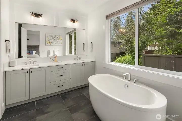 Spa bath with freestanding soaking tub and dual vanity